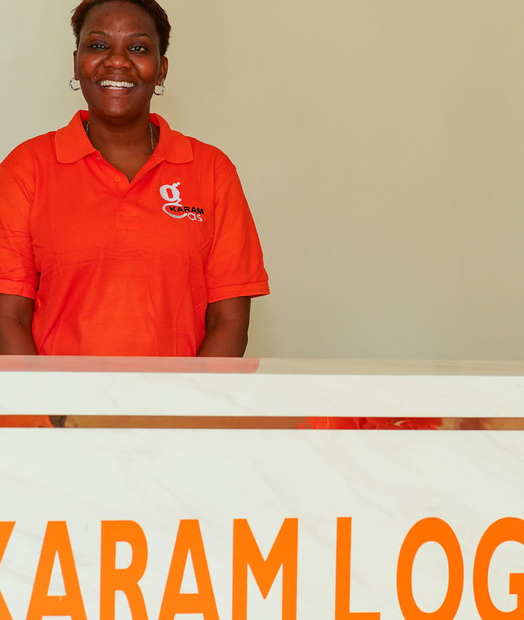 A Karam Gas customer care team member at the Karam Logistics front desk